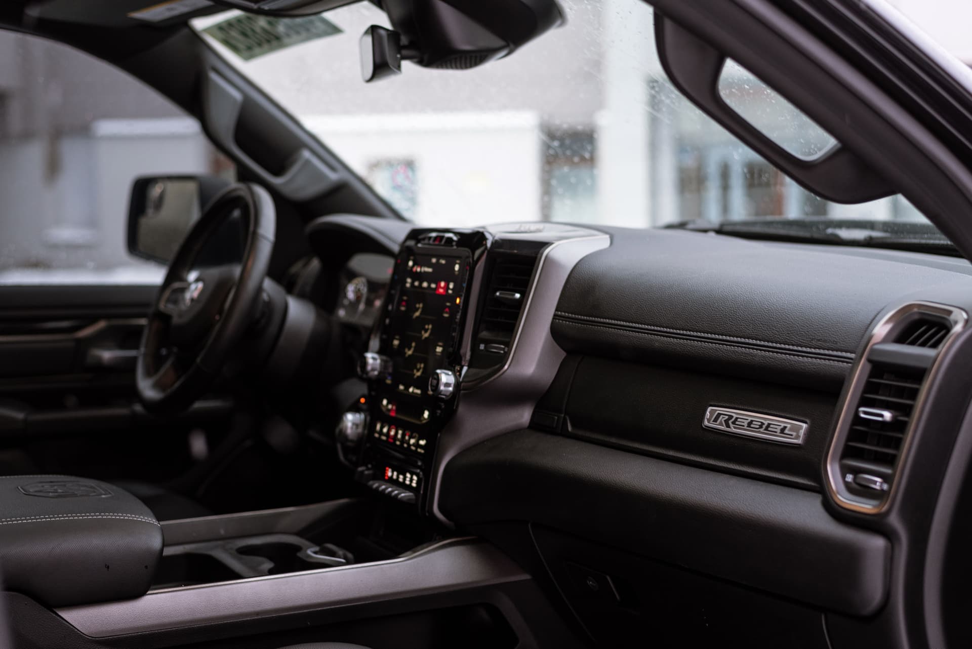 Detailed view of the contemporary Dodge Ram 1500 Rebel interior with advanced features