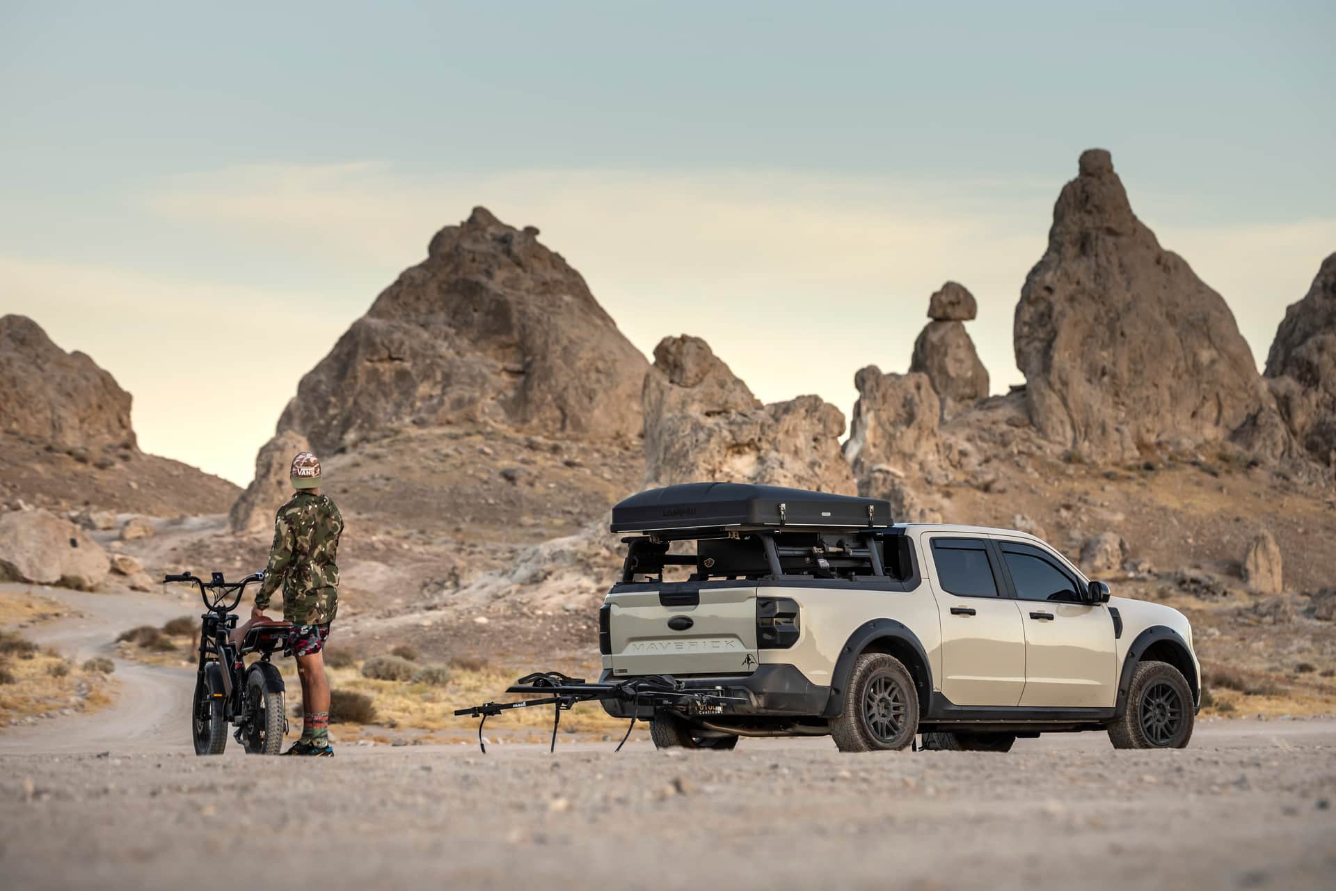 Explore the scenic desert with an off-road truck and bicycle